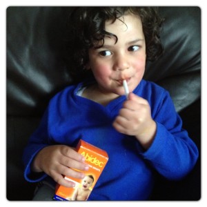 Little man having Abidec Multivitamin