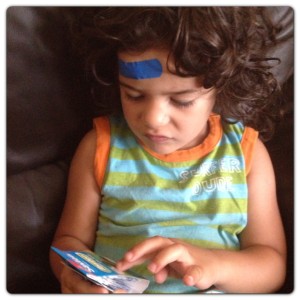 Little Man with Blue Plaster