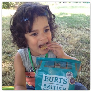 Little Man Enjoying Burts Chips