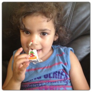 Little Man Enjoying the Laughing Cow