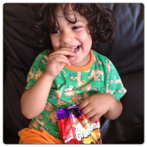 Little Man Enjoying Cadbury Crunchums