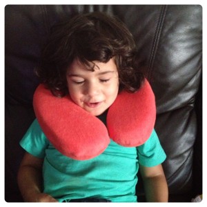 Little Man Trying Neck Pillow