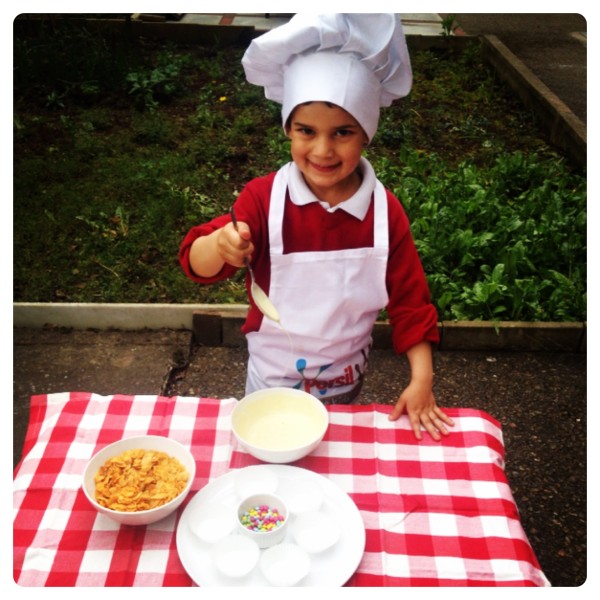 Little Man Making Chocolate Egg Nests