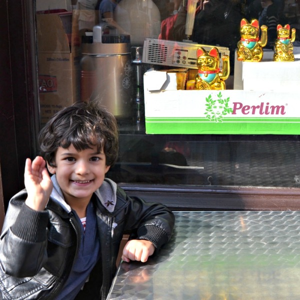 Chinatown: Little Man Copying a Chinese Lucky Cat