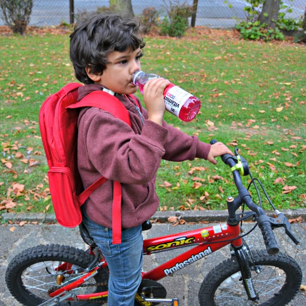 Refreshing Vitamin Water While Riding a BIke