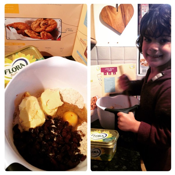 Little Man Making Cinnamon and Raisins Cookies